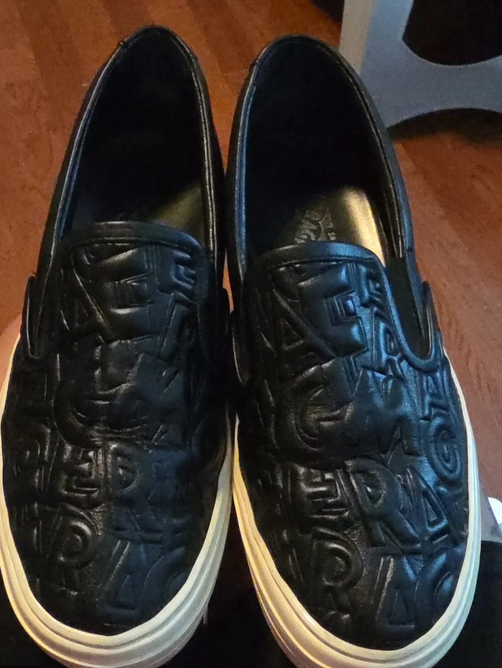 Salvatore Ferragamo Black Embossed Leather Slip-On Sneakers with White Sole